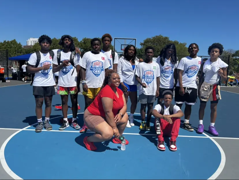 JTSA youth participants and organizers gathered on the basketball court